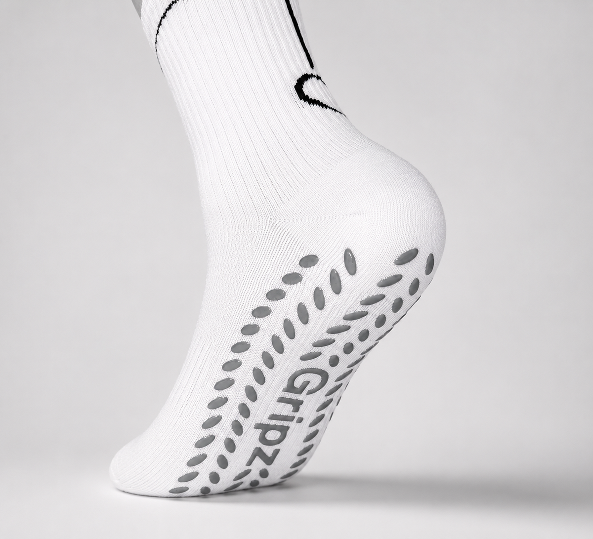 Performance socks providing grip and stability for athletes